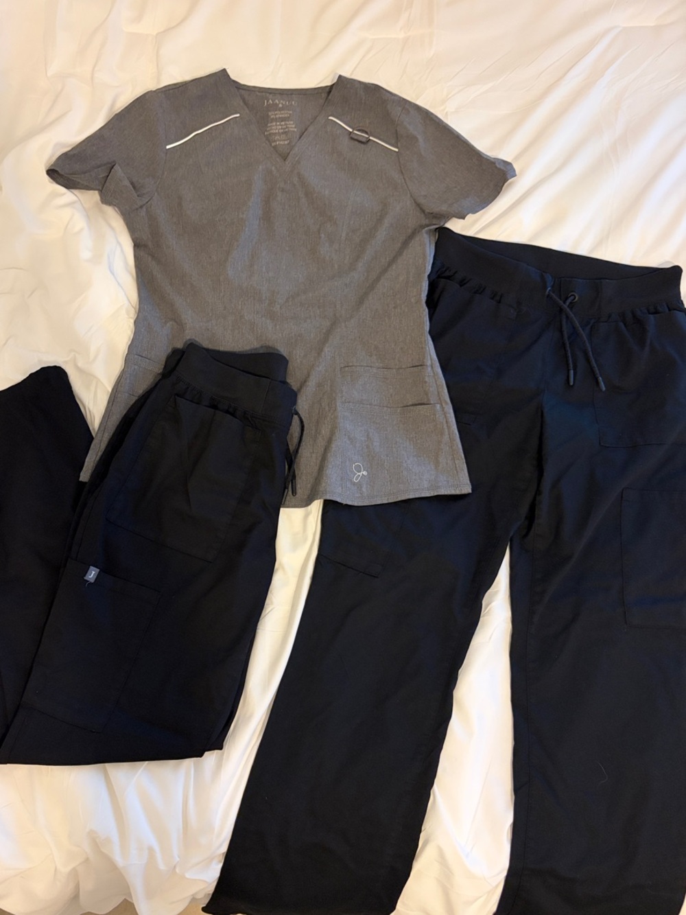 Jaanuu Scrub Top with Black Scrub Pants